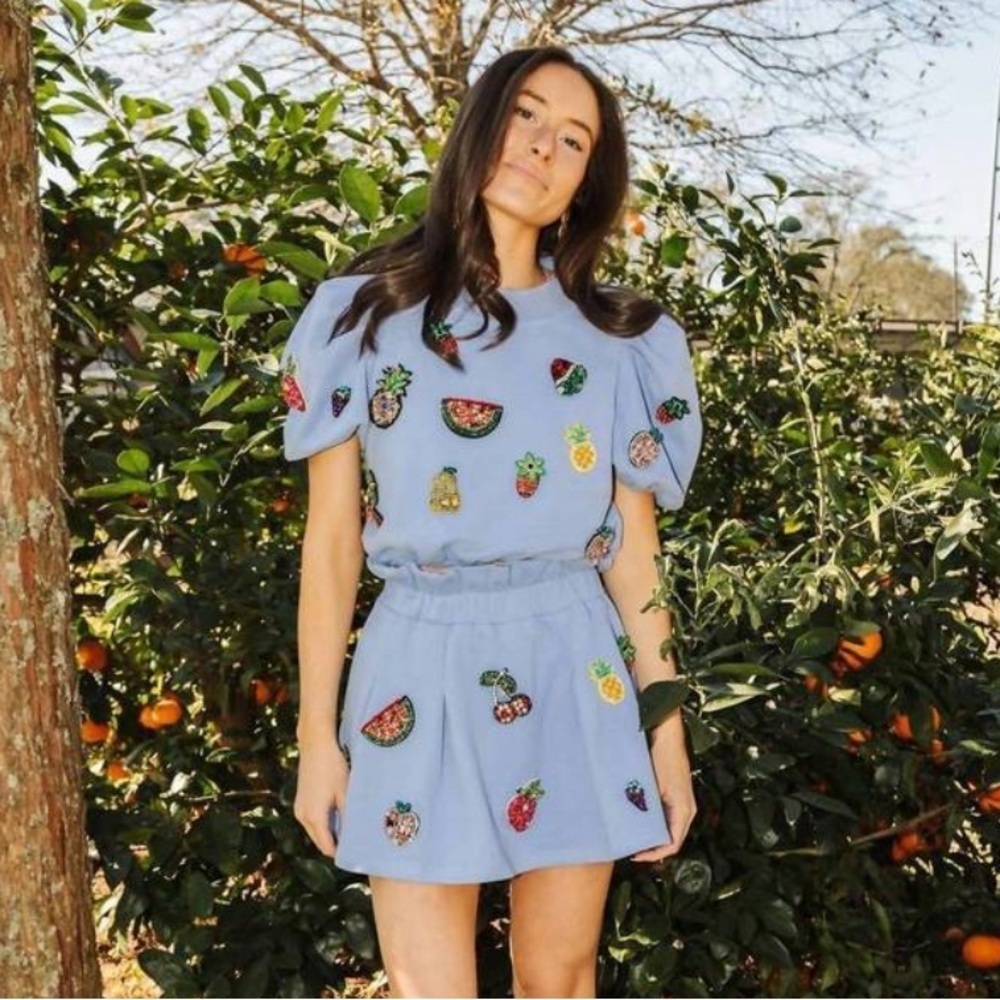 QUEEN OF SPARKLES Light Blue Puff Sleeve Crop Top with Fruit Embellishments